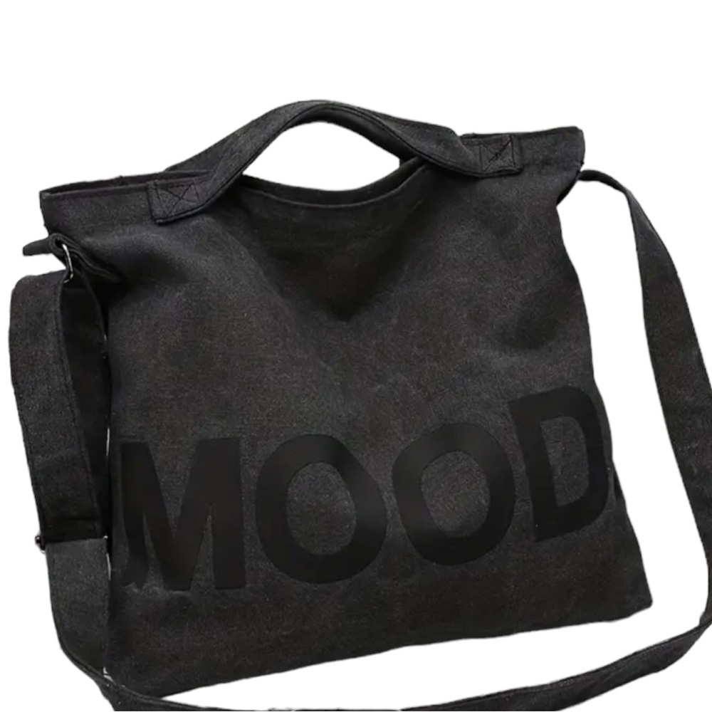 “Mood” cute canvas tote bad. Black with adjustable strap. New with tags.
